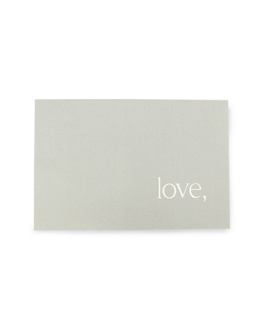 Gray card with 'love,' text on a white background