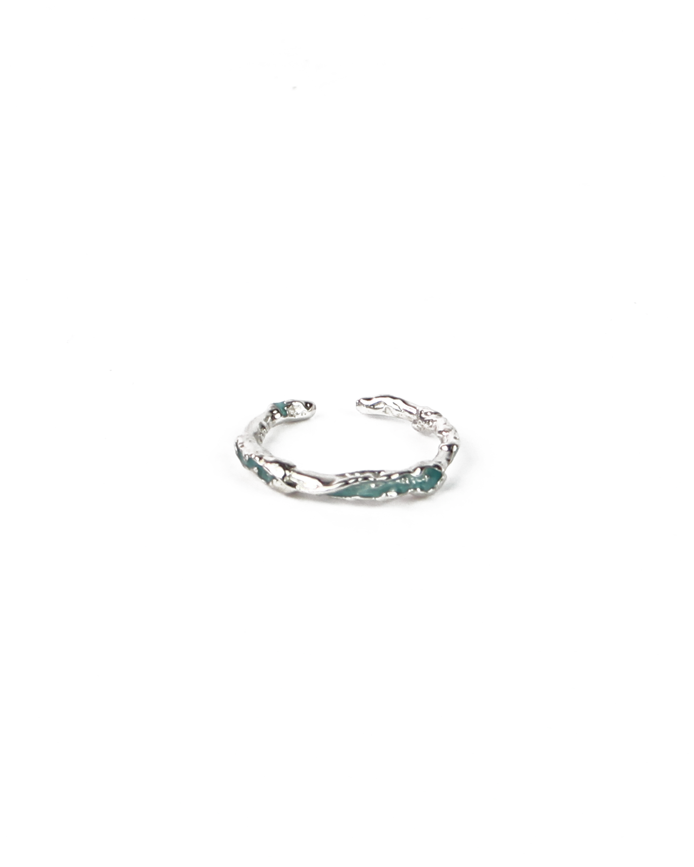 Silver ring with blue enamel on a white background