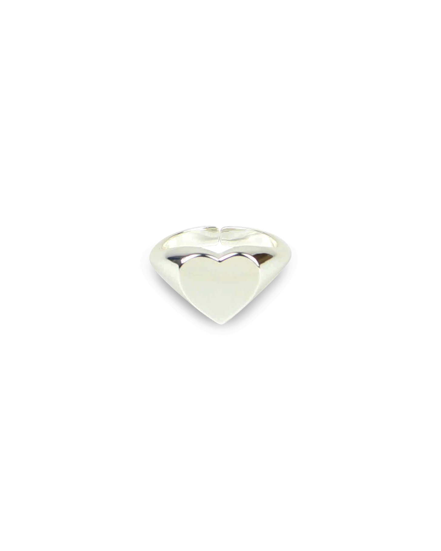 Silver heart-shaped object on a white background