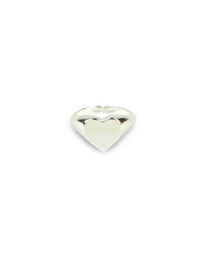 Silver heart-shaped object on a white background