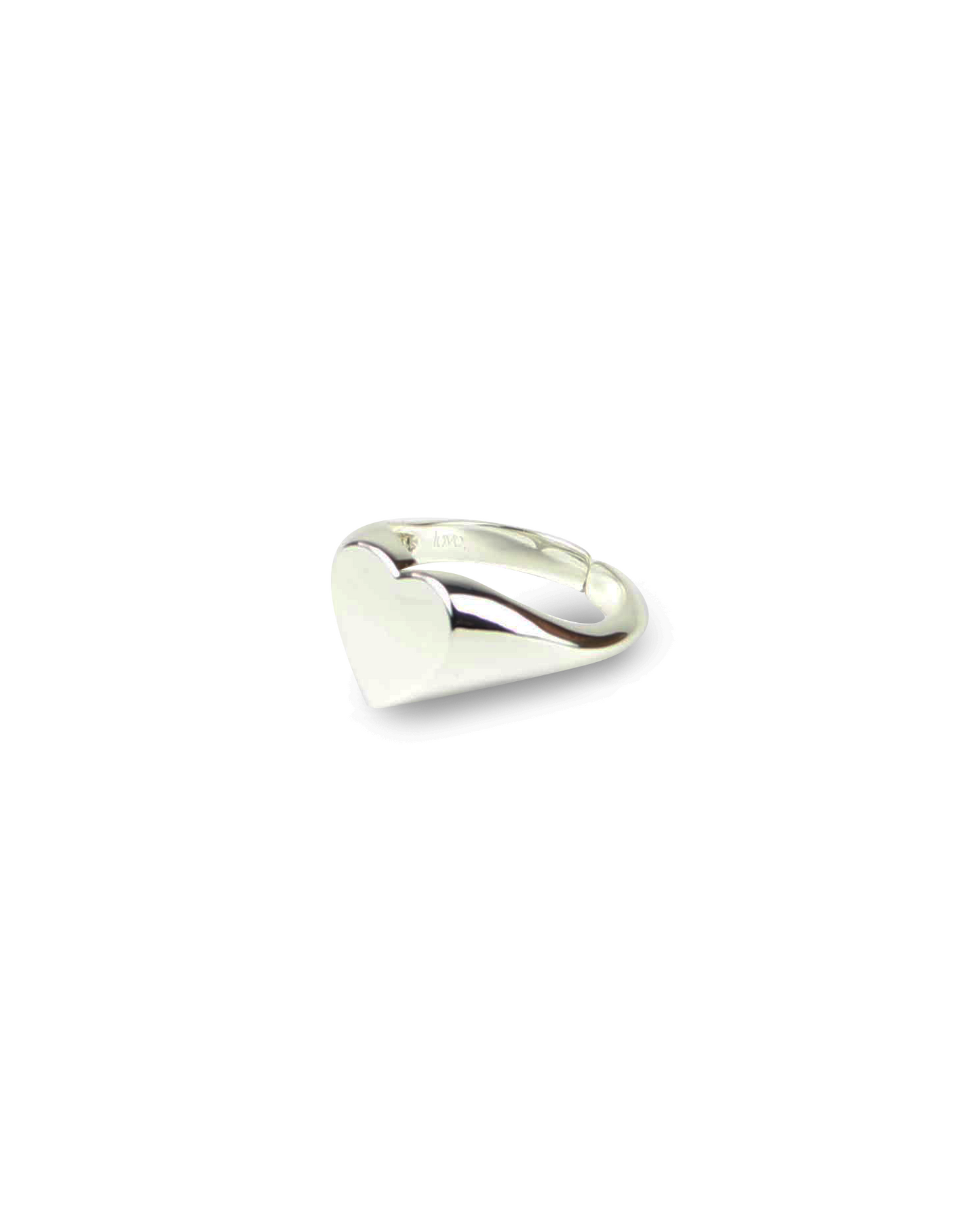 Silver heart-shaped ring on a white background