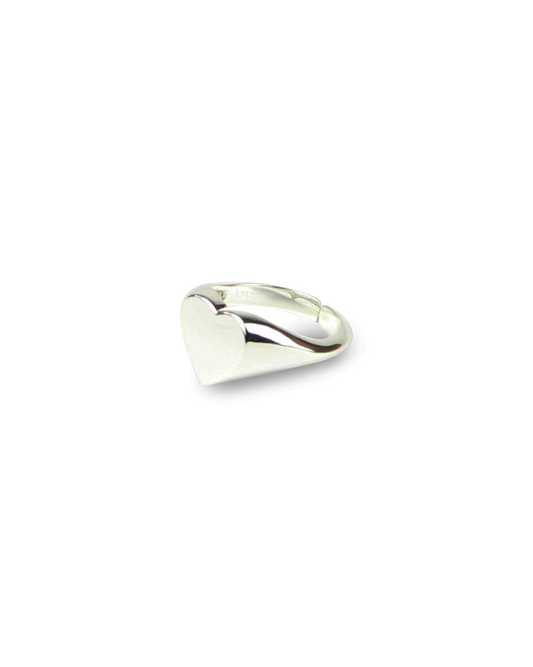 Silver heart-shaped ring on a white background