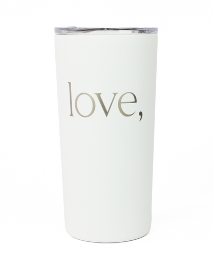 White tumbler with 'love,' text on a white background