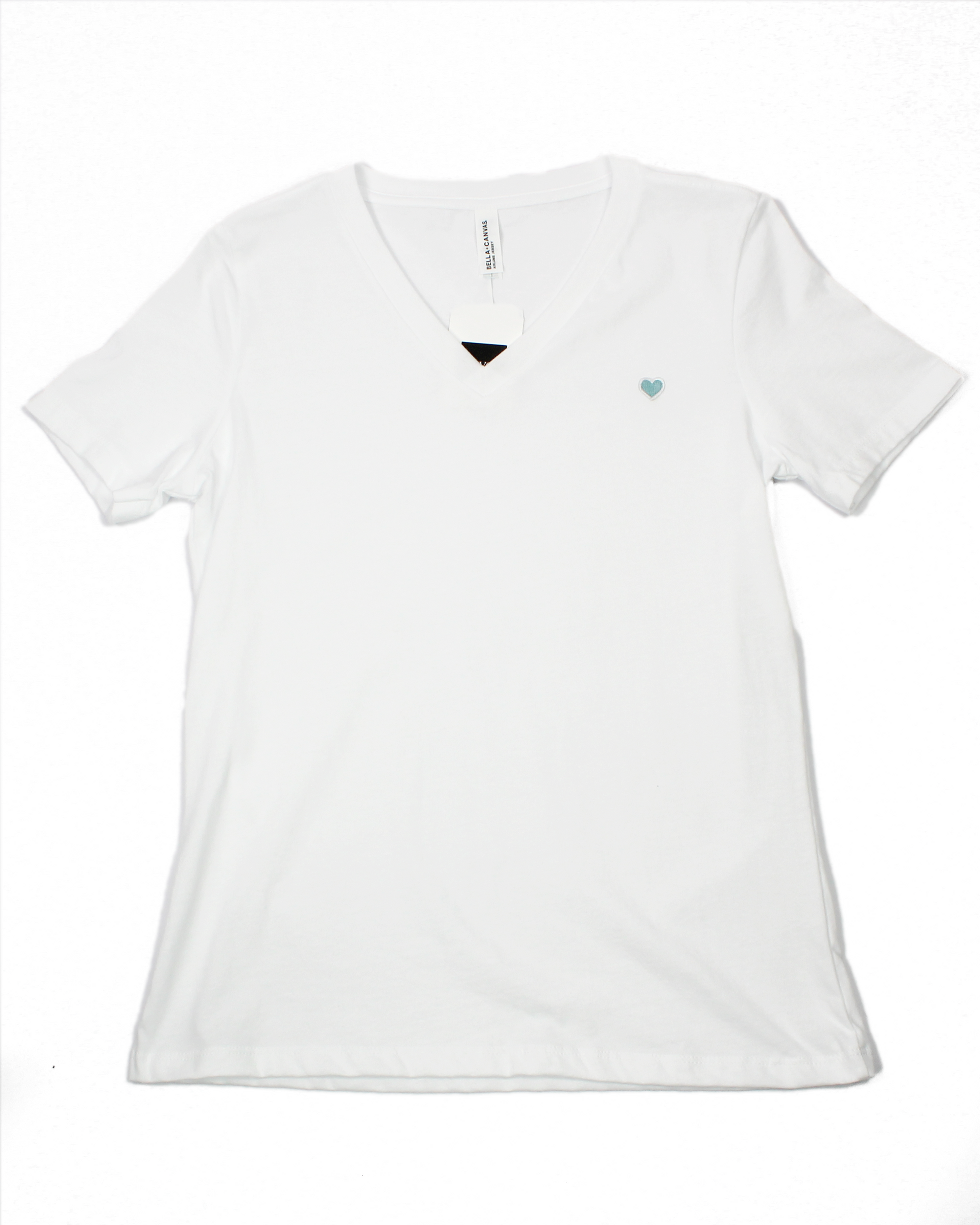white vneck tee with heart patch on chest