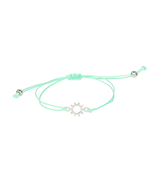 Mint green bracelet with a silver sun charm on a white background